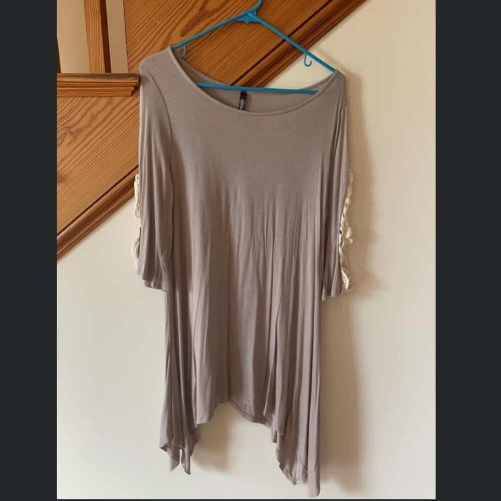 Women’s Mittoshop brand dress. Sleeves have a crochet detail. Size small.